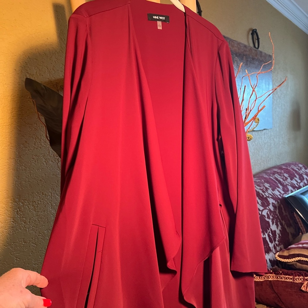 Set of jacket and pant, size Large in a burgundy color. Nine West brand.